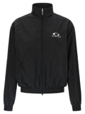 Veste bomber noire en coton de la marque Balenciaga, avec détails modernes et coupe ajustée.