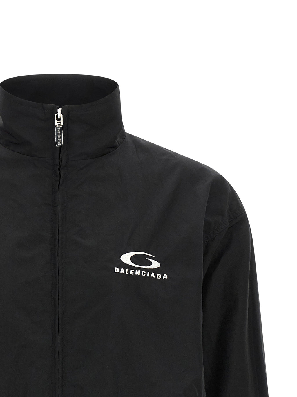 Veste bomber noire en coton de Balenciaga, coupe ajustée avec détails modernes, vue de face sur un fond neutre.