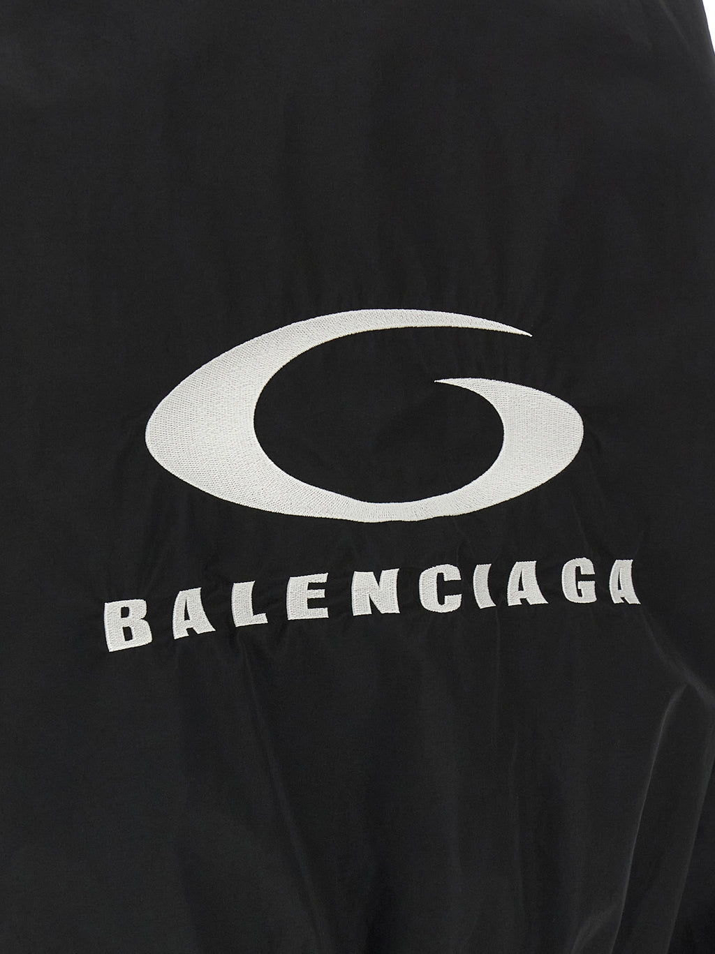 Veste bomber noire en coton de la marque Balenciaga, fermeture éclair, style décontracté, vue de face.