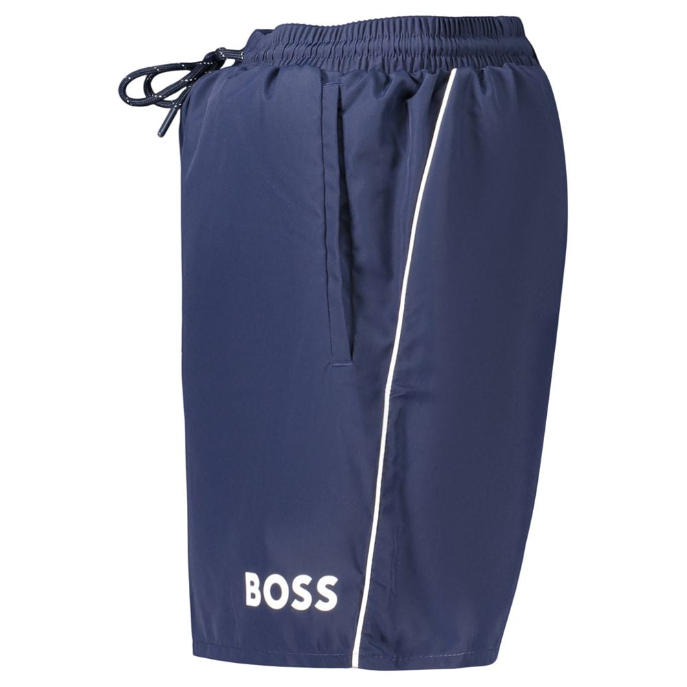 Maillot de bain homme en polyester bleu de la marque Hugo Boss, avec coupe classique et design élégant.
