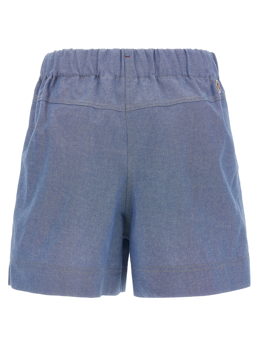 Shorts bermuda en coton bleu de la marque Moncler Grenoble, style décontracté et confortable, visibles en détail dans l'image.