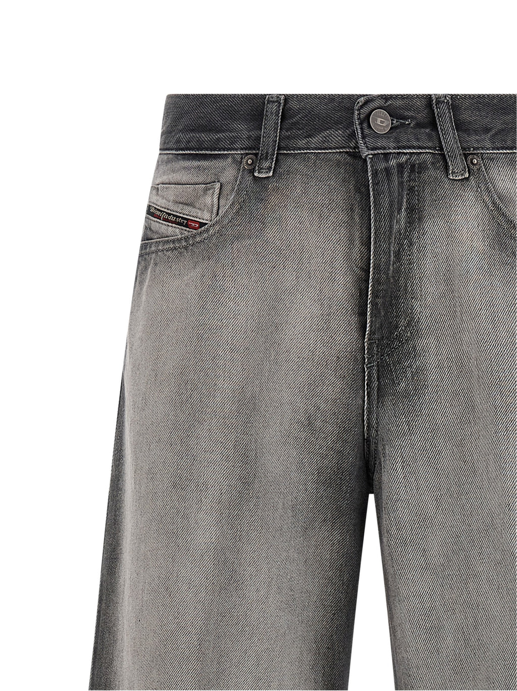 Jeans évasés en coton gris Diesel, style décontracté avec coupe fluide et détails modernes visibles sur l'image.