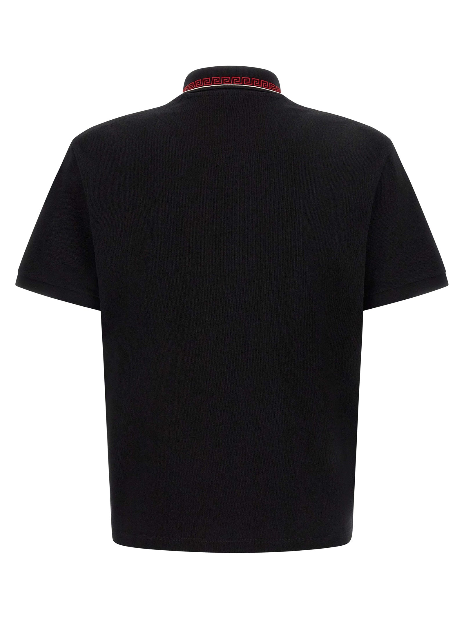 Chemise polo en coton noir de la marque Versace, style élégant avec logo distinctif, vue de face sur fond neutre.