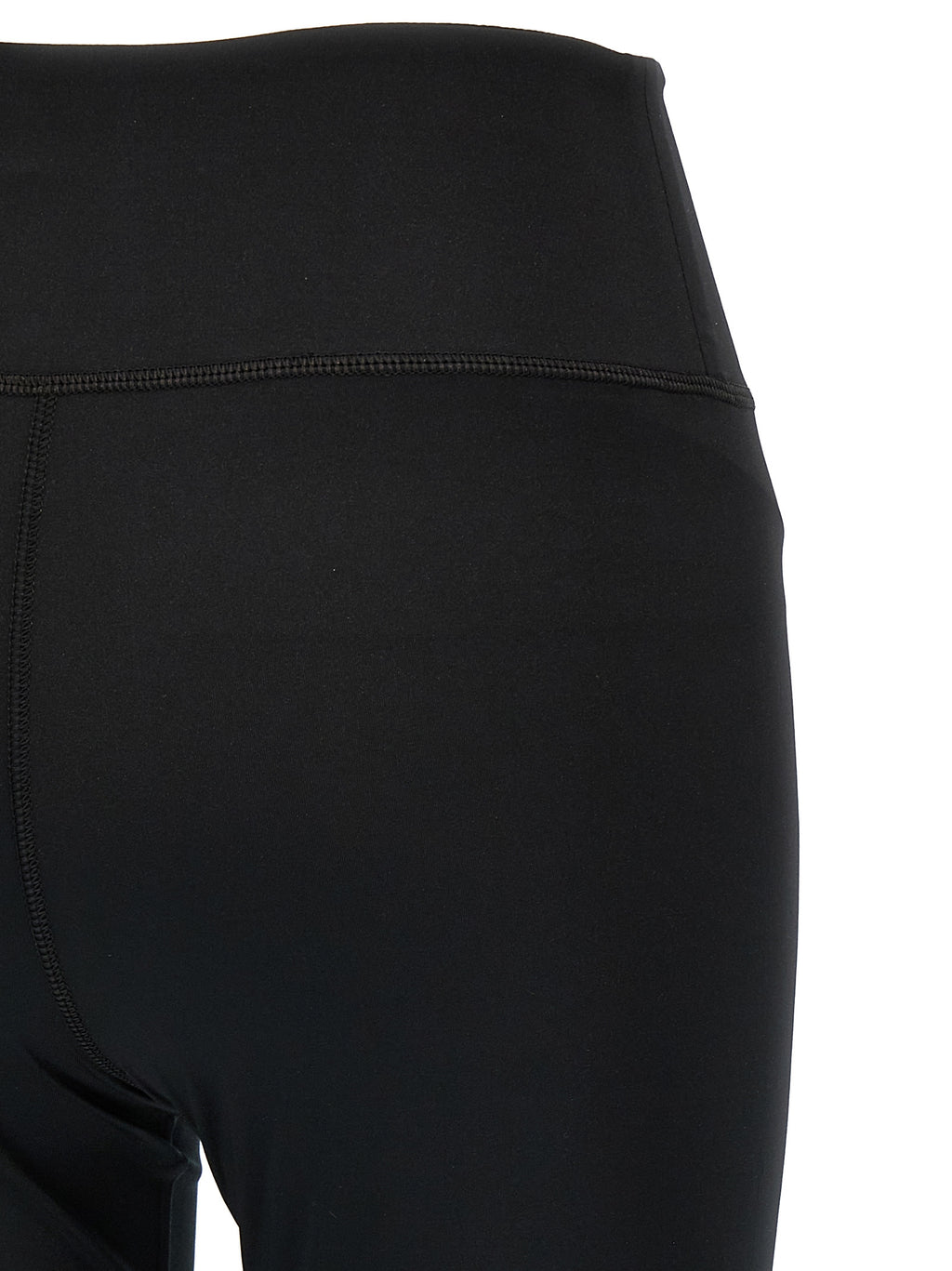 Leggings en polyester noir de la marque Balenciaga, ajustés et élégants, visibles sur l'image.