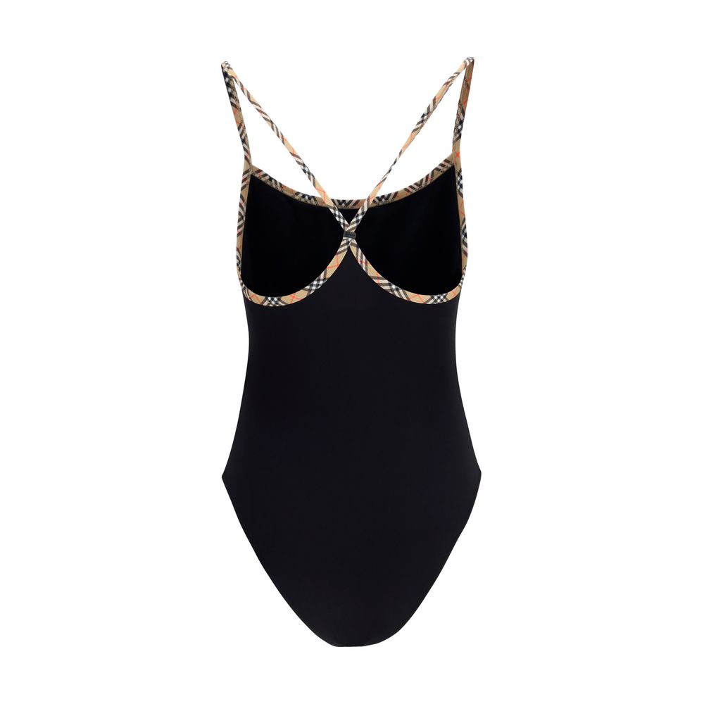 Maillot une pièce noir en polyamide de Burberry, design élégant avec logo emblématique, visible en détail.