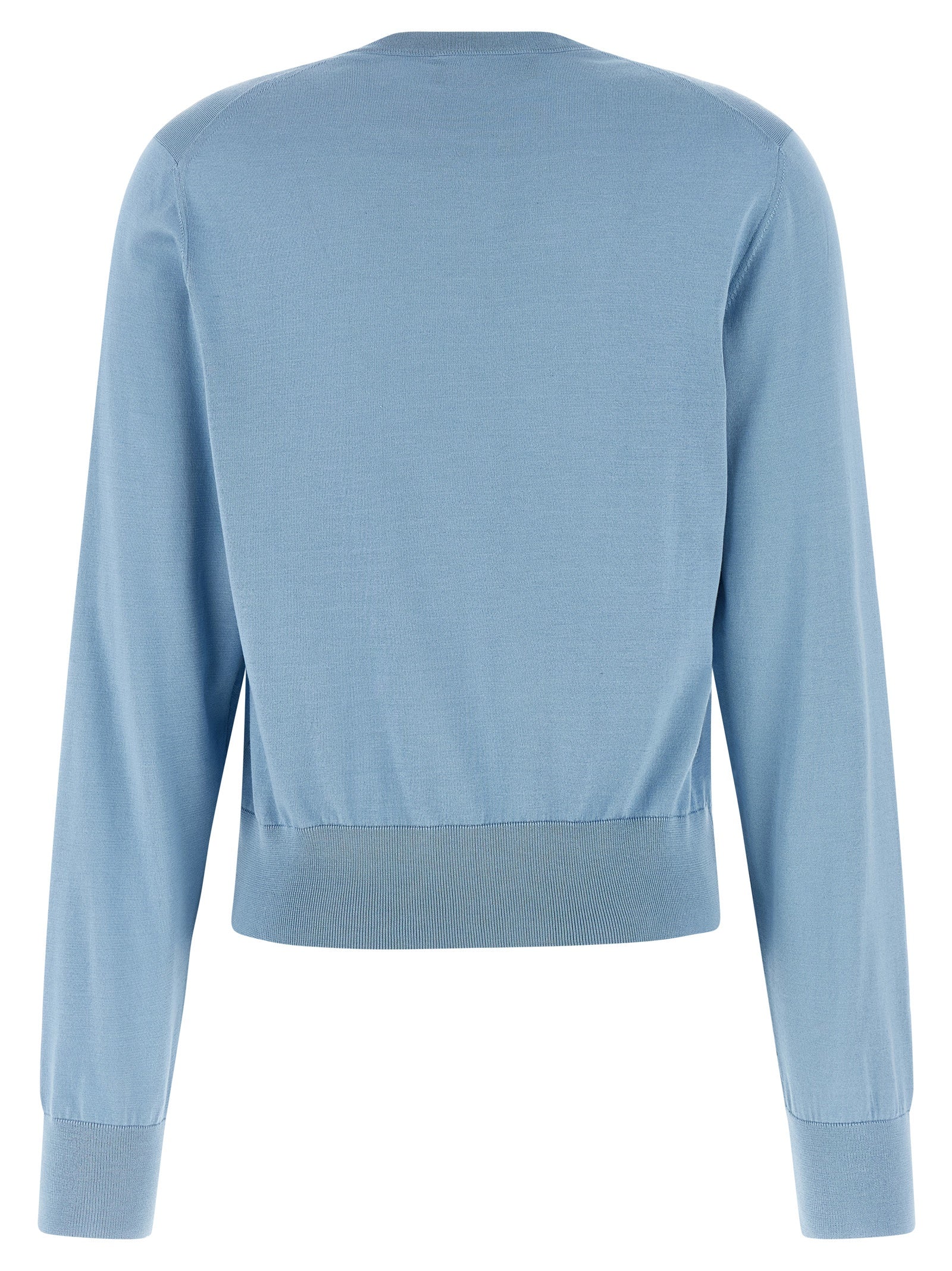 Cardigan en soie bleue de Dolce & Gabbana, finition élégante, porté sur un fond neutre.