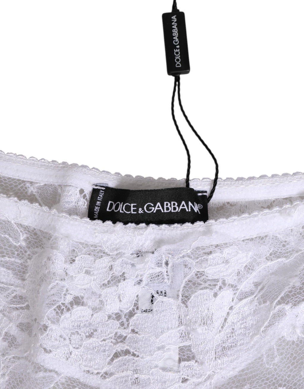 Culotte blanche en dentelle florale Dolce & Gabbana, taille basse, avec détails élégants et finition raffinée.
