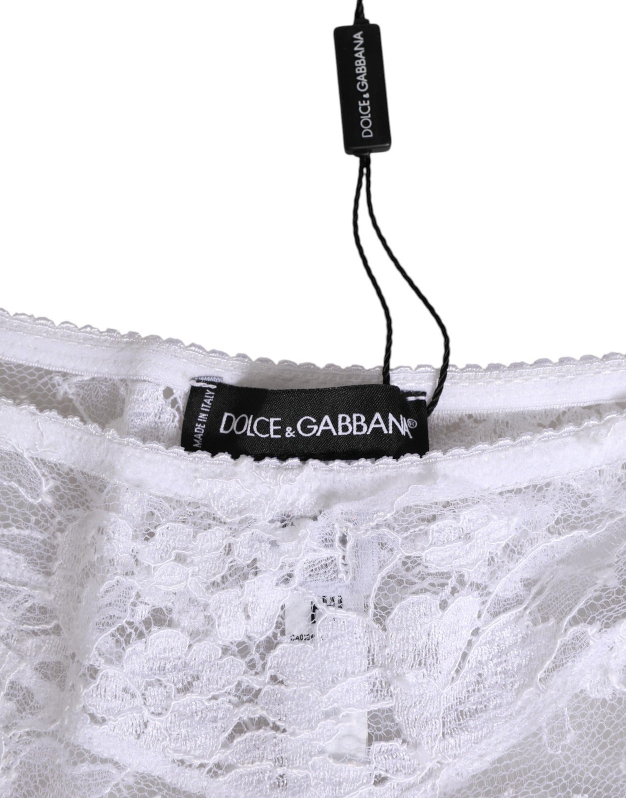 Culotte blanche en dentelle florale Dolce & Gabbana, taille basse, avec détails élégants et finition raffinée.