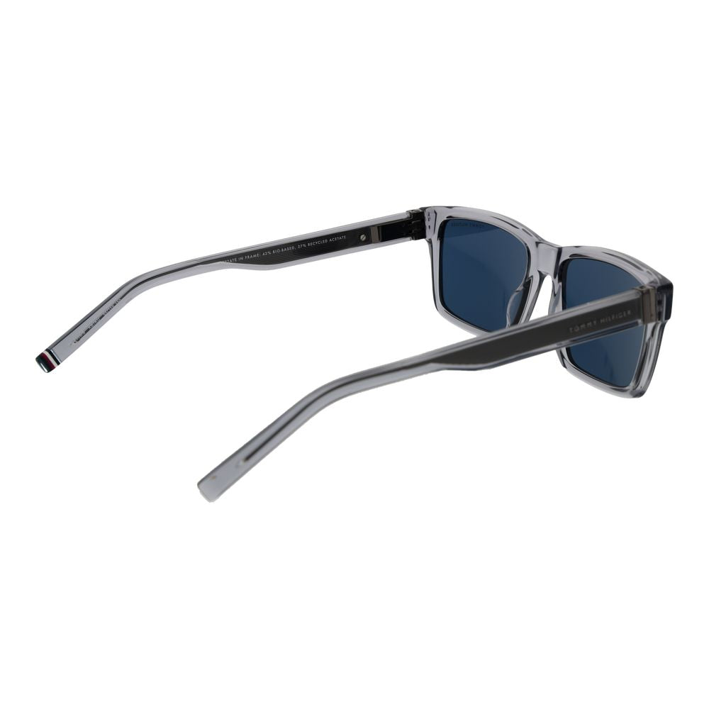 Lunettes de soleil Tommy Hilfiger en acétate gris, avec monture élégante et branches épaisses, pour un style sophistiqué.