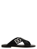 Sandales noires en cuir de veau de Dolce & Gabbana, élégantes et confortables, avec design en cuir lisse.