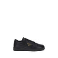 Chaussures basses en cuir de veau noir Prada Bos Taurus, sneakers low top élégants et modernes pour homme.