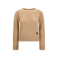 Pull beige en cachemire Burberry avec col rond et manches longues, douceur luxueuse pour un style élégant.
