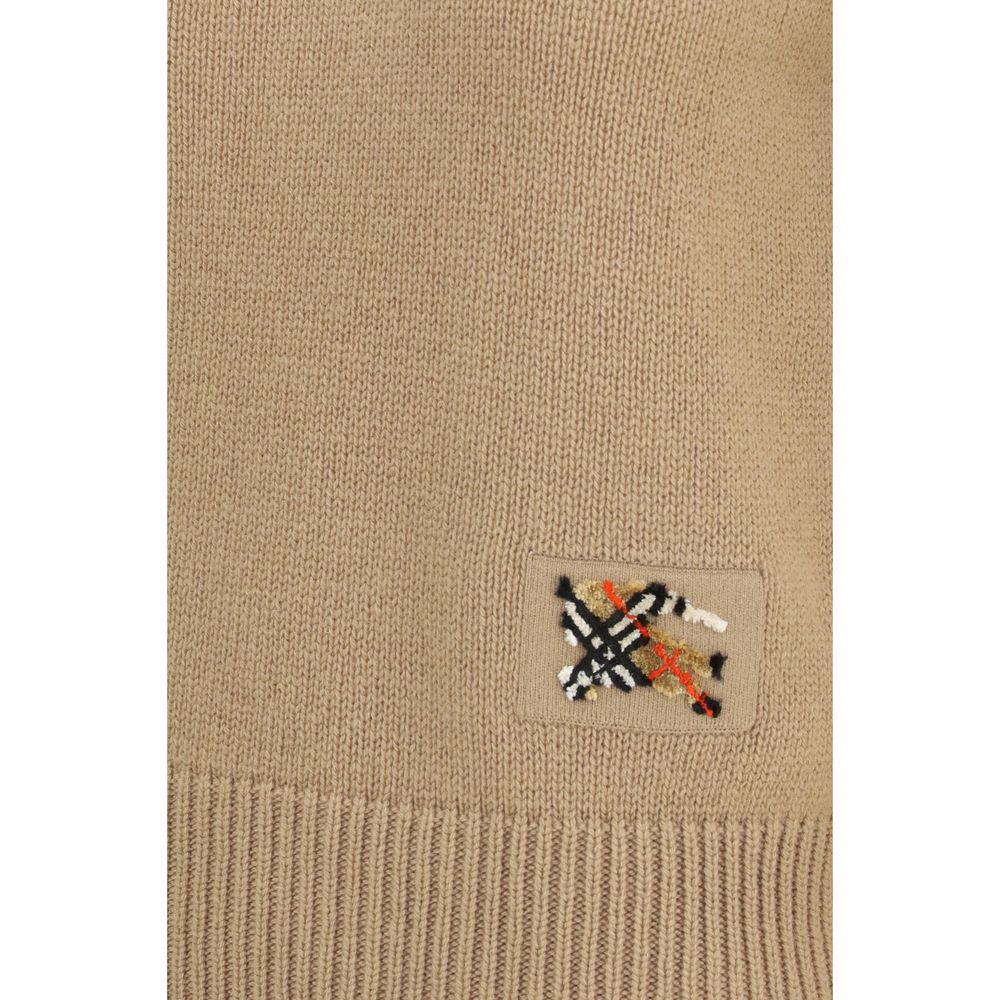 Pull en cachemire beige de Burberry, sweat-shirt doux avec col rond et logo discret, parfait pour un style élégant et confortable.