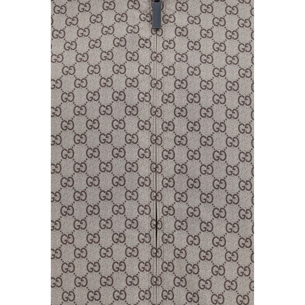 Veste en polyester noire Gucci pour homme, style élégant avec logo Gucci visible sur la poitrine.