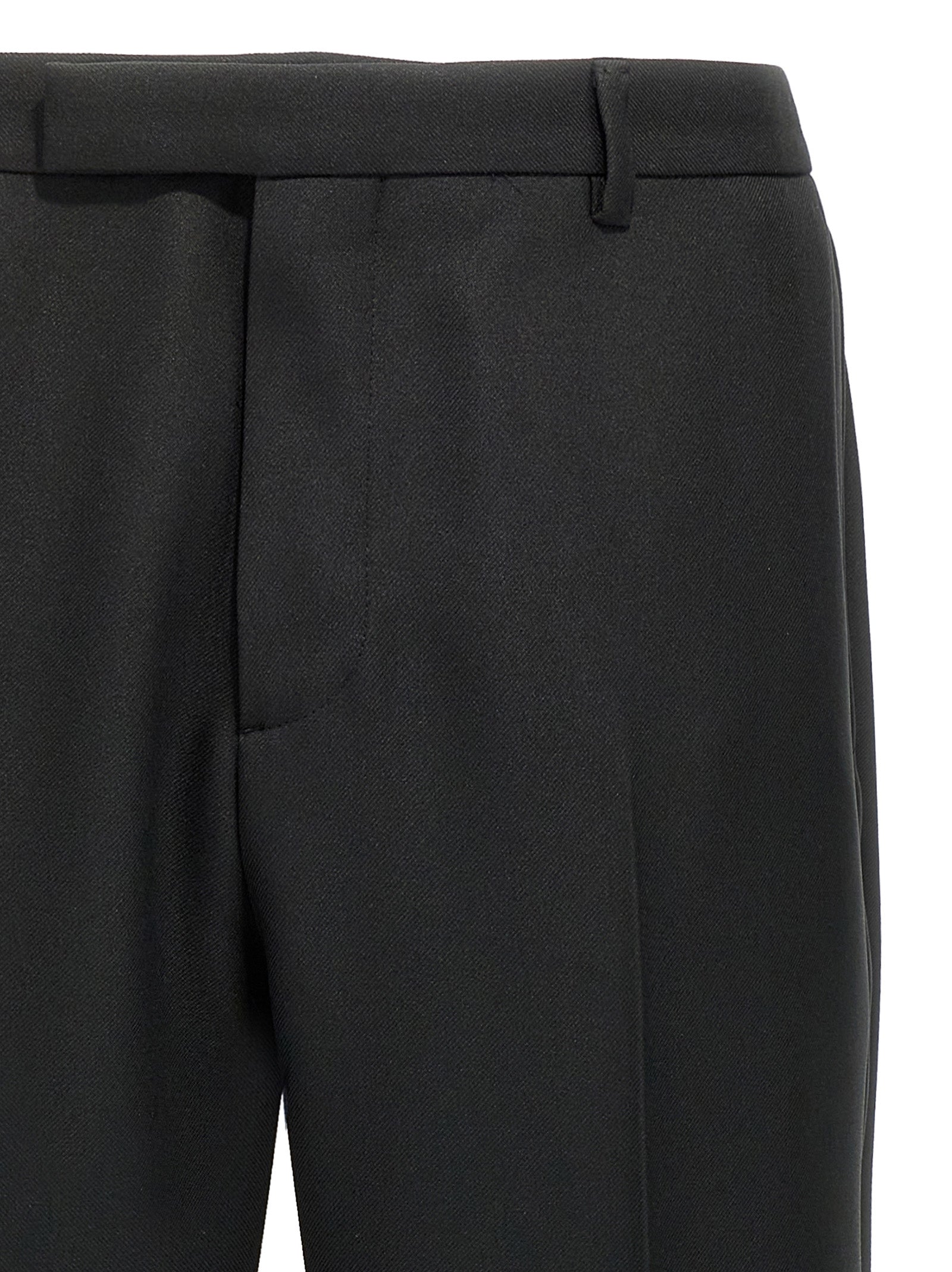 Pantalons décontractés en polyester noir de Gucci, coupe élégante, avec détails modernes et logo discret.