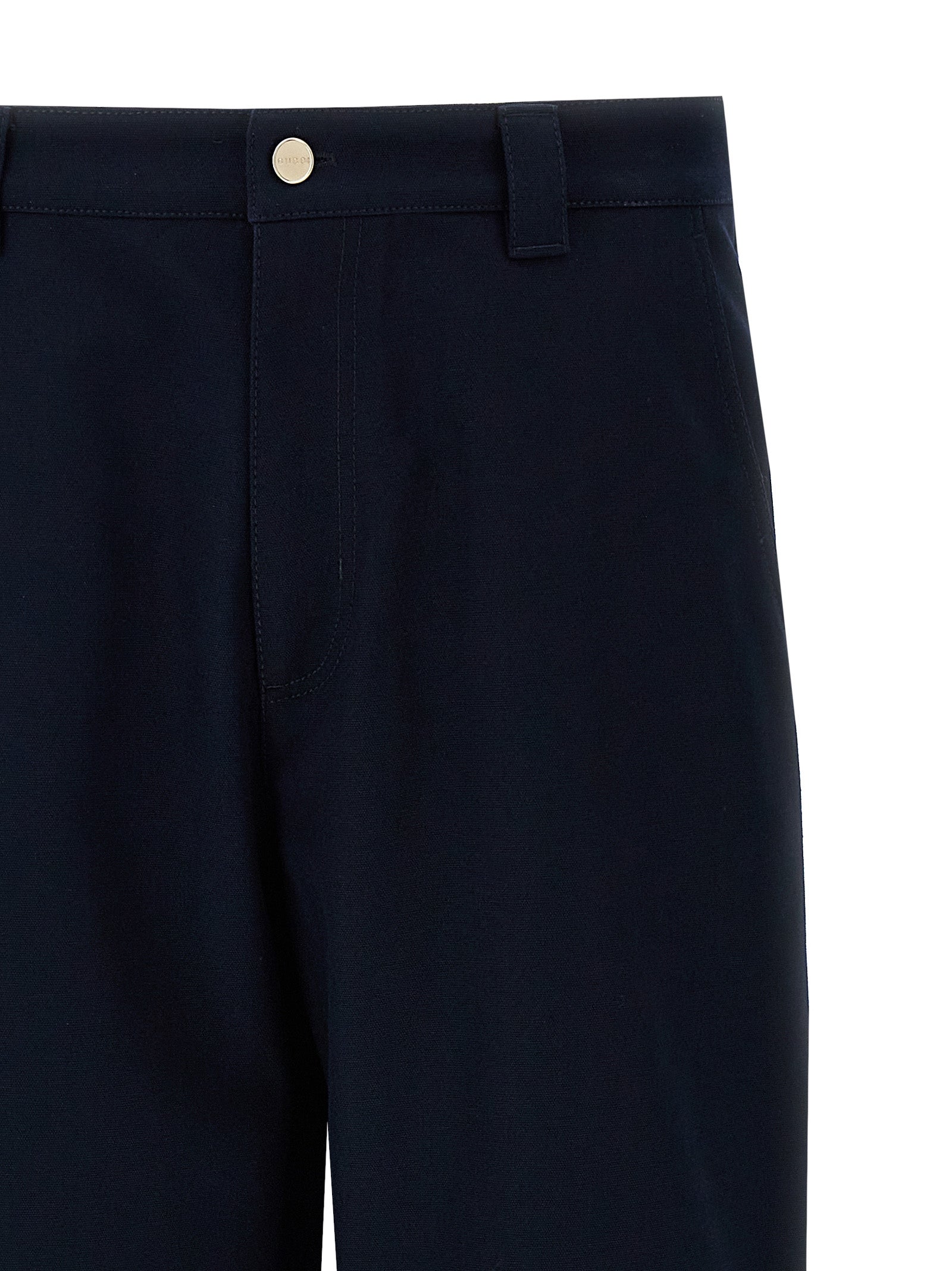 Pantalon casual en coton bleu Gucci pour homme, coupe décontractée et style tendance, visible dans l'image.
