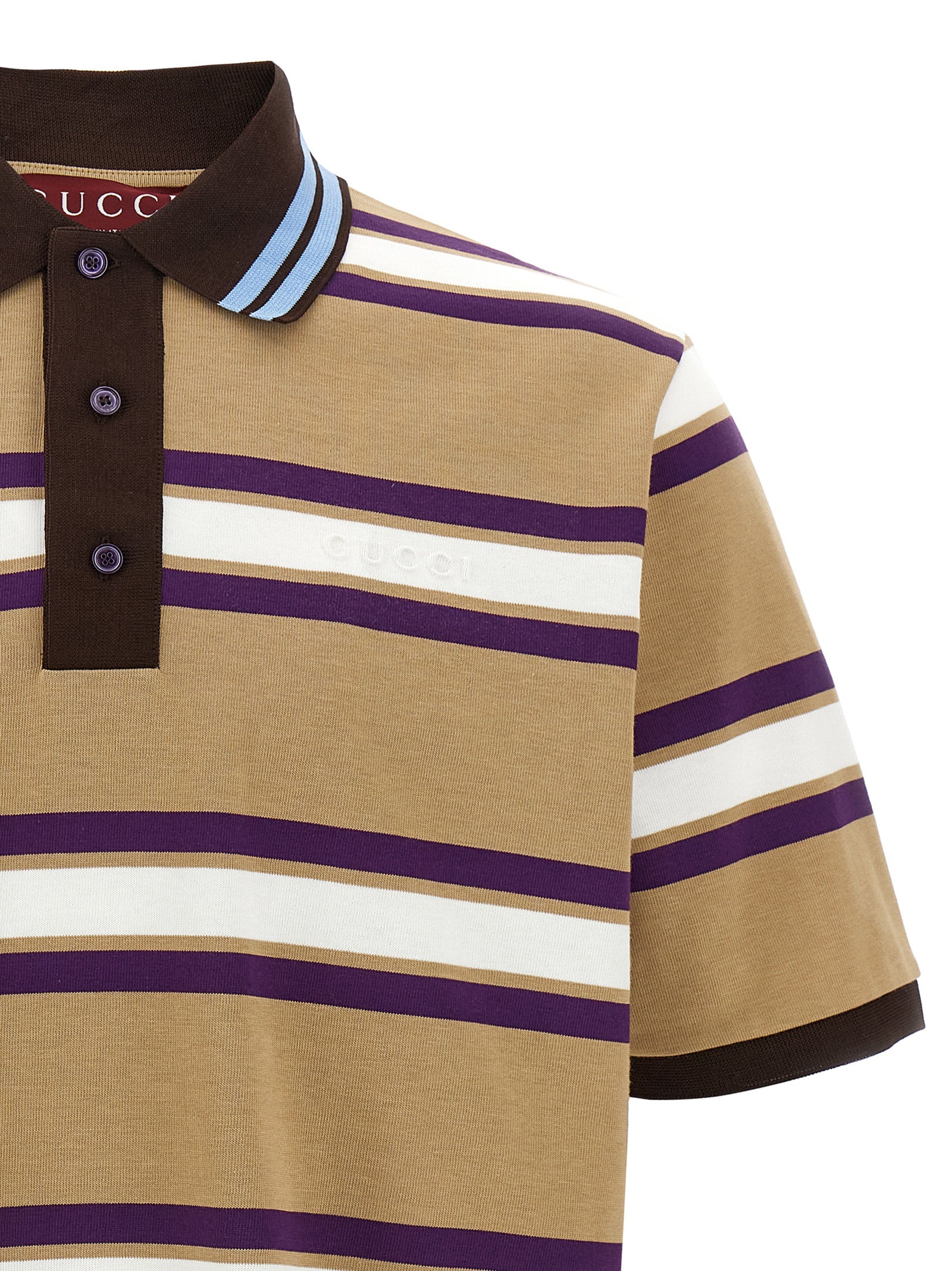 Chemise polo en coton multicolore de Gucci, avec logo, portée sur un mannequin, vue de face.