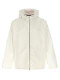 Veste en coton blanc Gucci, coupe Shell, avec détails de design élégants et logo Gucci visible sur le devant.
