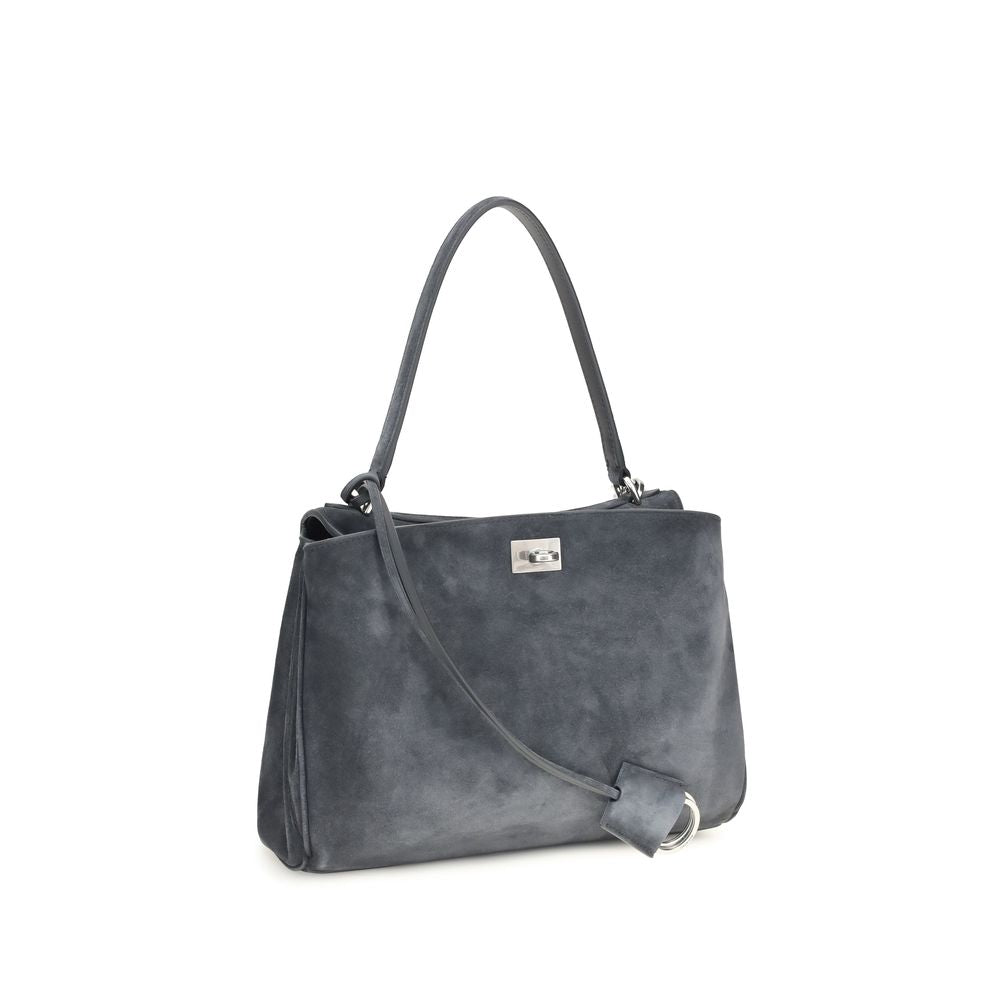 Sac à main Balenciaga Bos Taurus en cuir de veau gris, design élégant et sophistiqué, visible avec détails de la finition.