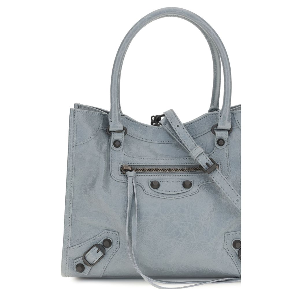 Sac à main Balenciaga en laine bleue Lamb Ovis Aries avec détails élégants et finition de haute qualité.