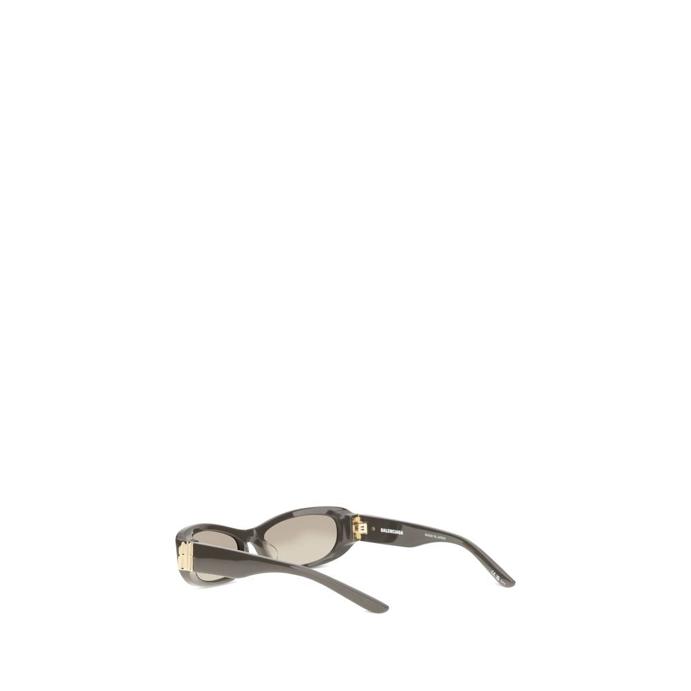 Lunettes de soleil marron en acétate Balenciaga avec monture épaisse et design moderne, vues de face.