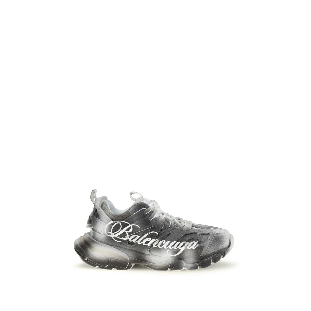 Baskets athlétiques grises Balenciaga en polyamide avec semelle blanche et design moderne, vues de face sur fond blanc.
