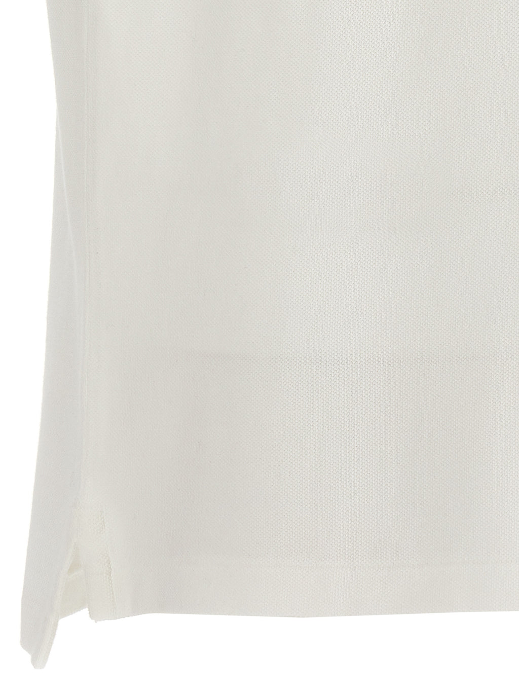 Chemise polo Ralph Lauren en coton blanc, classique et élégante, avec col et boutonnière, vue de face.