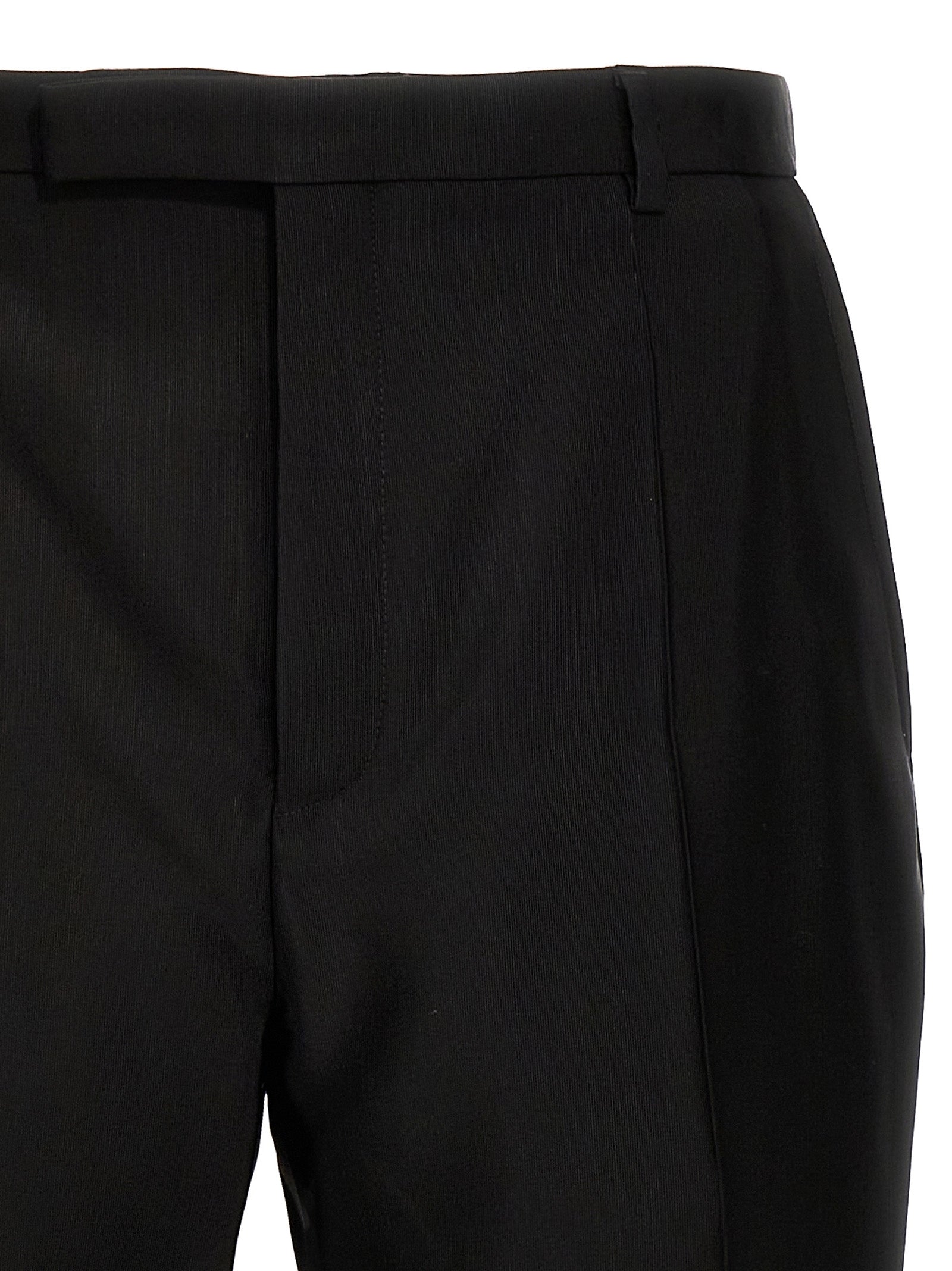 Pantalon noir en acétate de Saint Laurent, style élégant, ajusté, avec une coupe classique et une finition soignée.