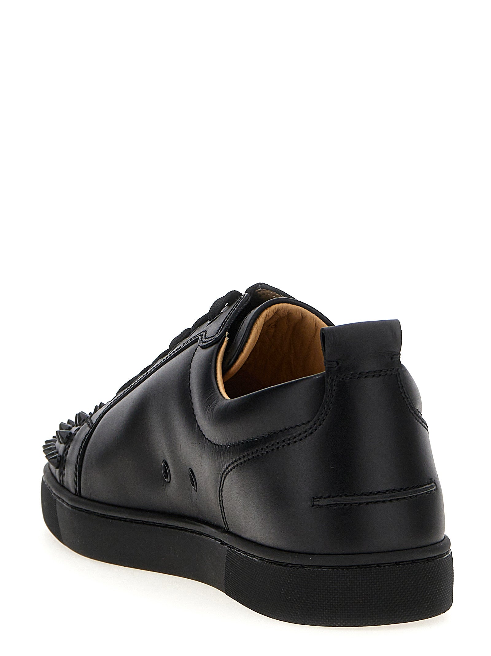 Chaussures Christian Louboutin en cuir de veau noir, baskets basses élégantes et tendance pour hommes.