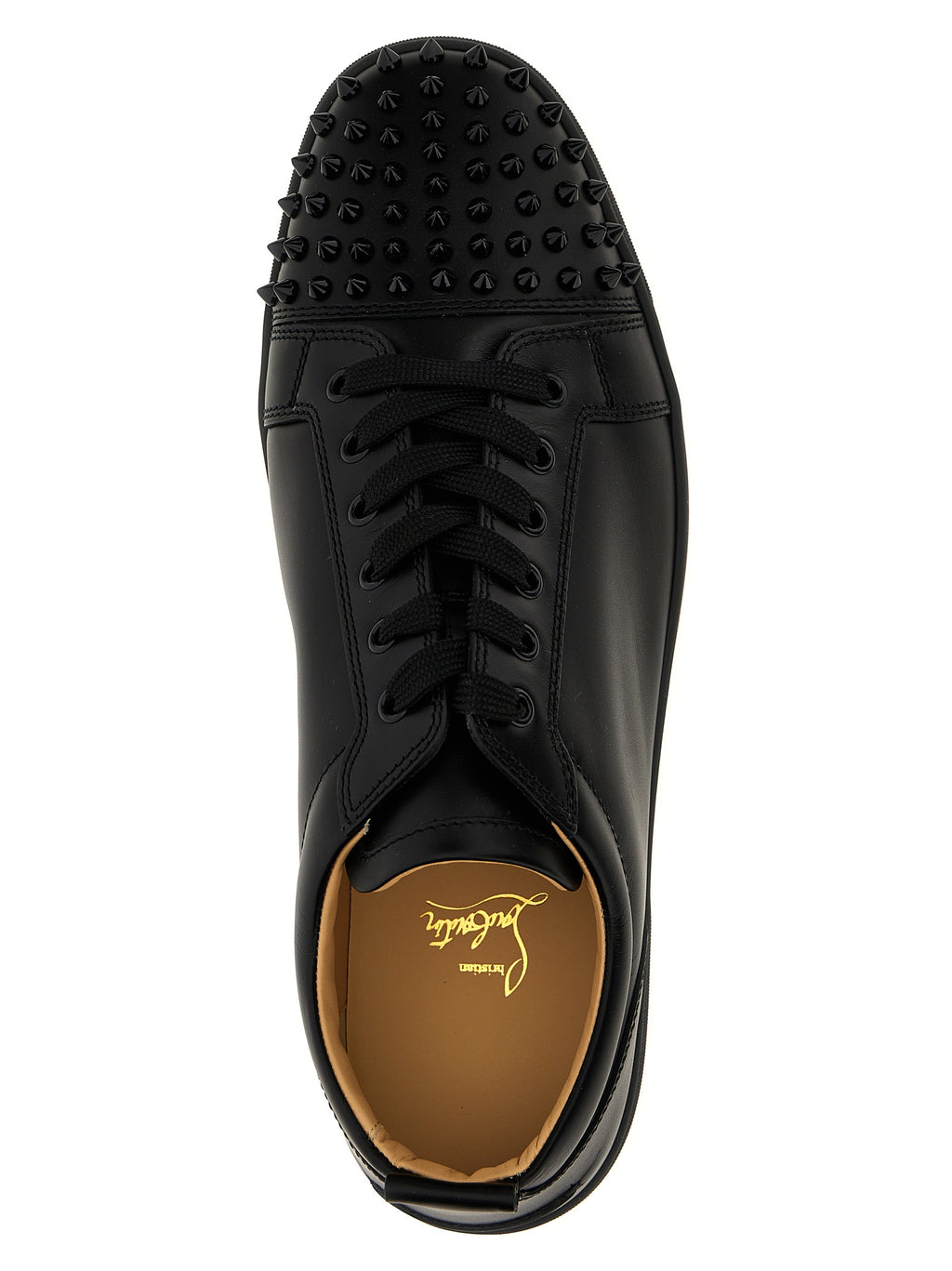 Baskets basses en cuir de veau noir Christian Louboutin avec semelles en caoutchouc et détails élégants.