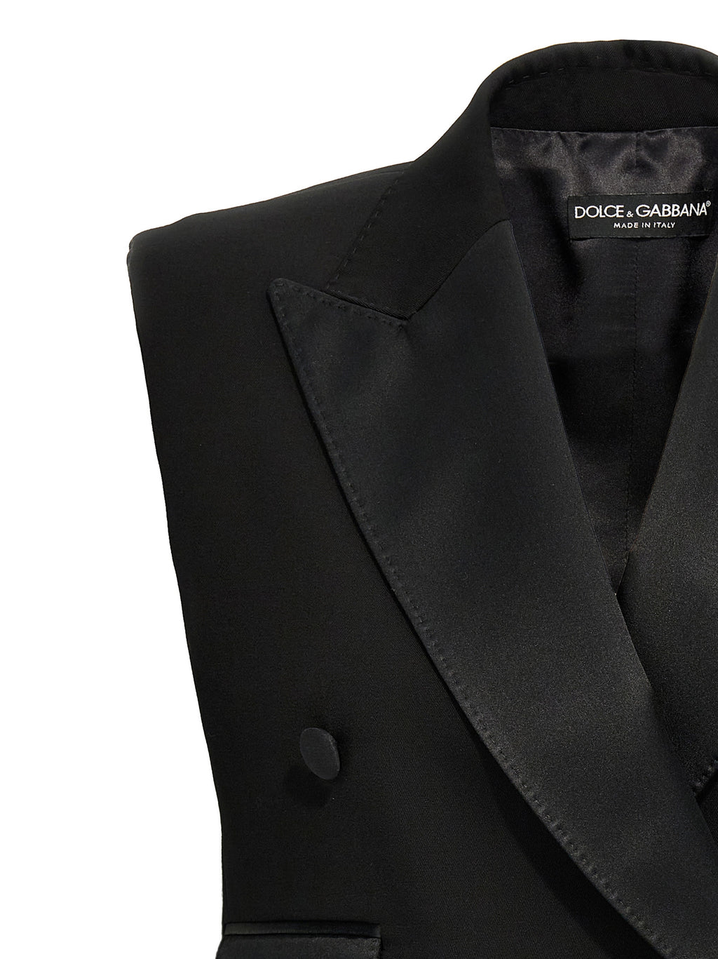 Veste sans manches en soie noire de Dolce & Gabbana, élégante et sophistiquée, vue en gros plan.