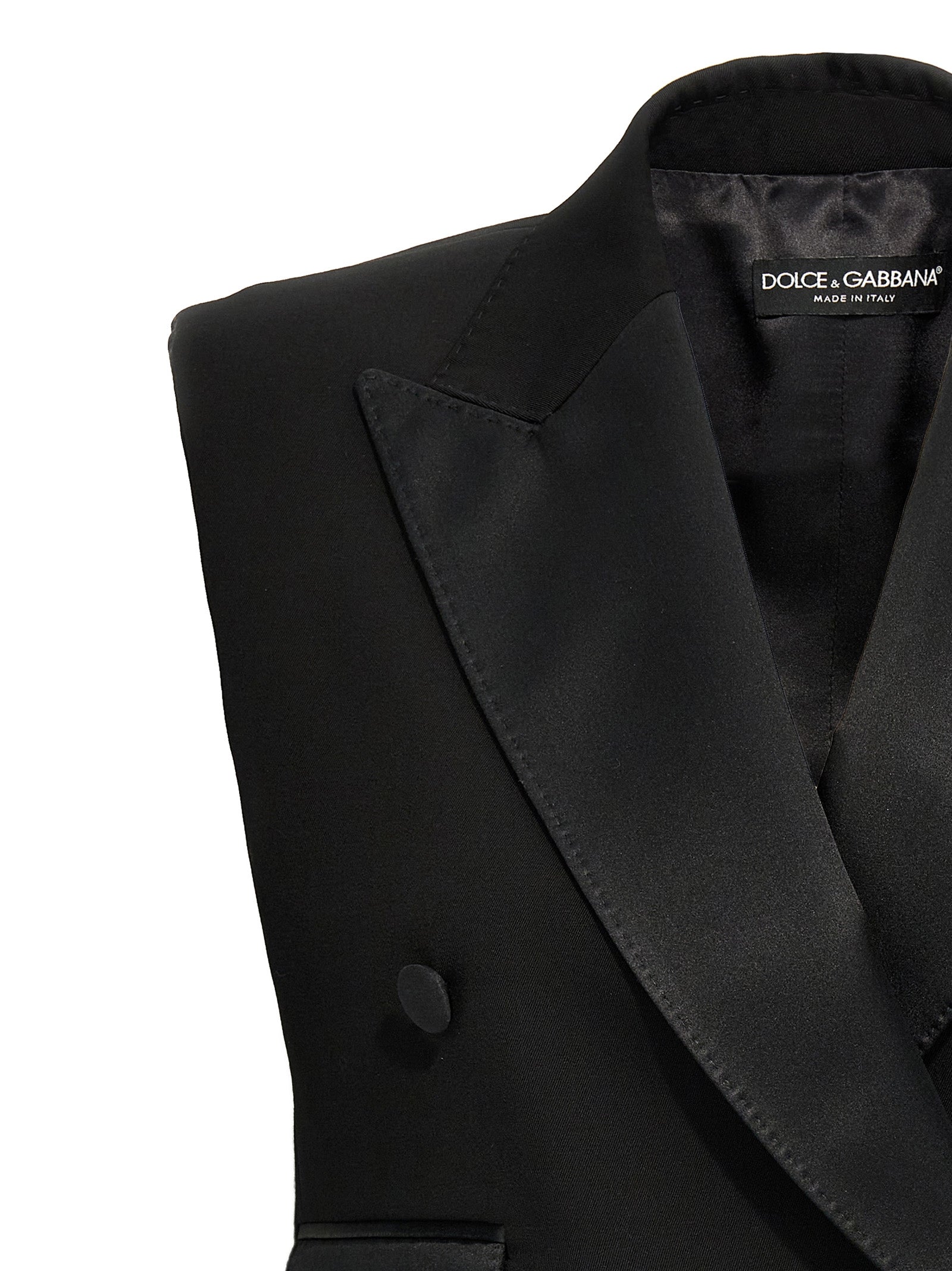 Veste sans manches en soie noire de Dolce & Gabbana, élégante et sophistiquée, vue en gros plan.