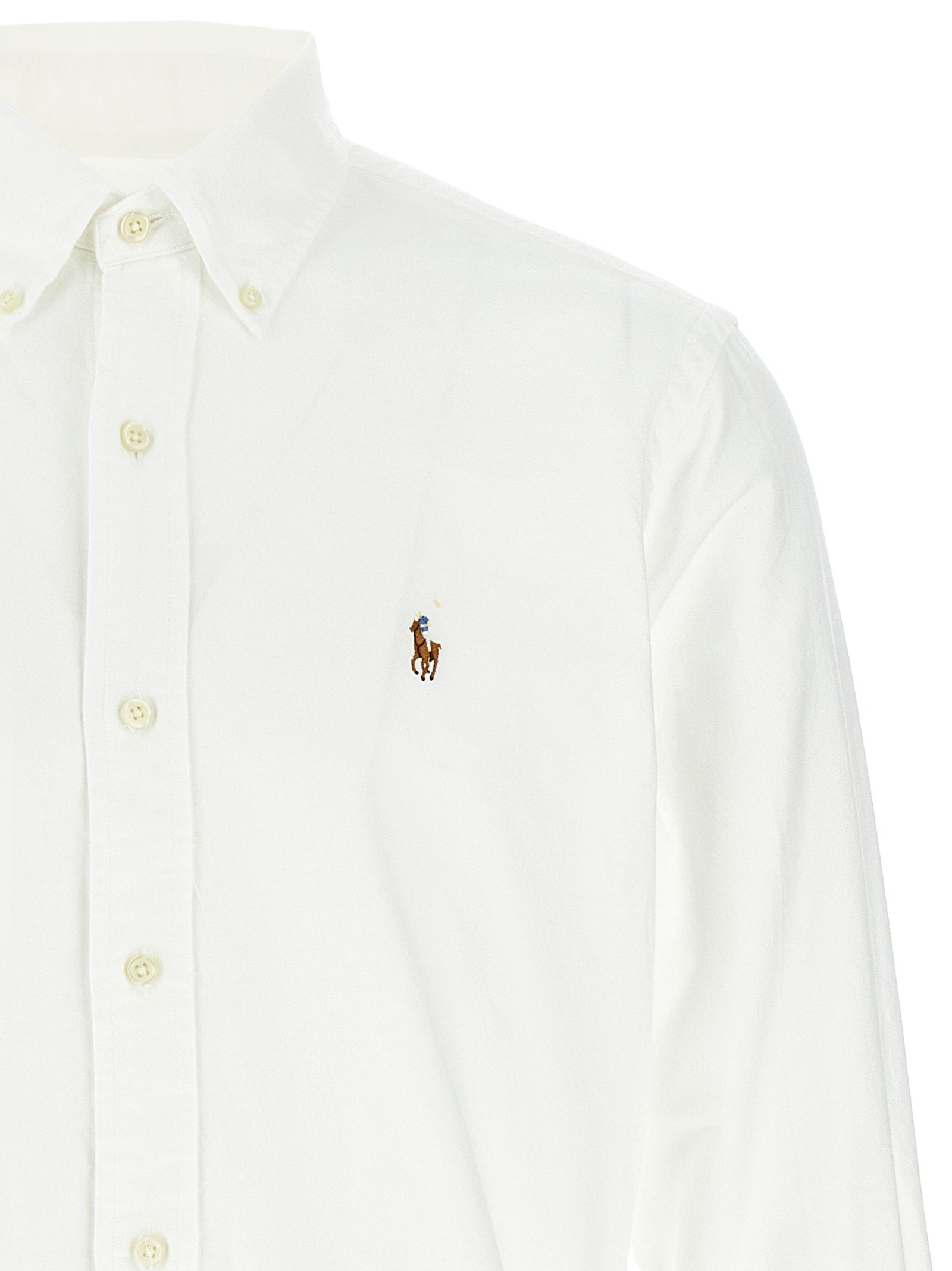 Chemise blanche en coton Polo Ralph Lauren, col classique, manches longues, coupe élégante, visible sur l'image.