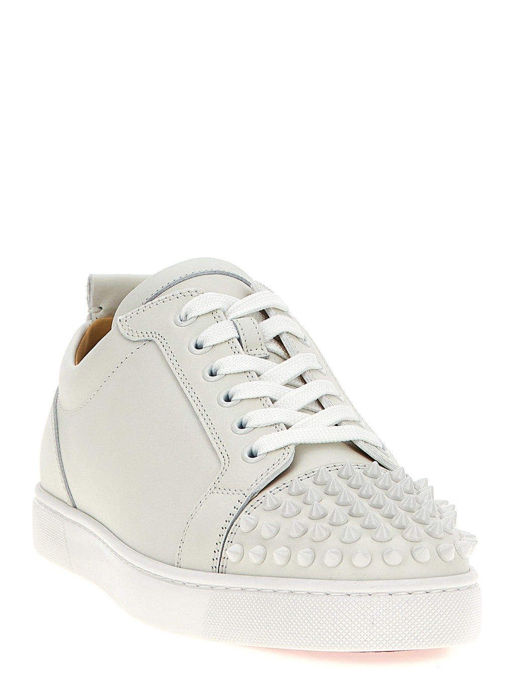 Chaussures Christian Louboutin sneakers basses en cuir de veau blanc, style décontracté avec semelles contrastantes.