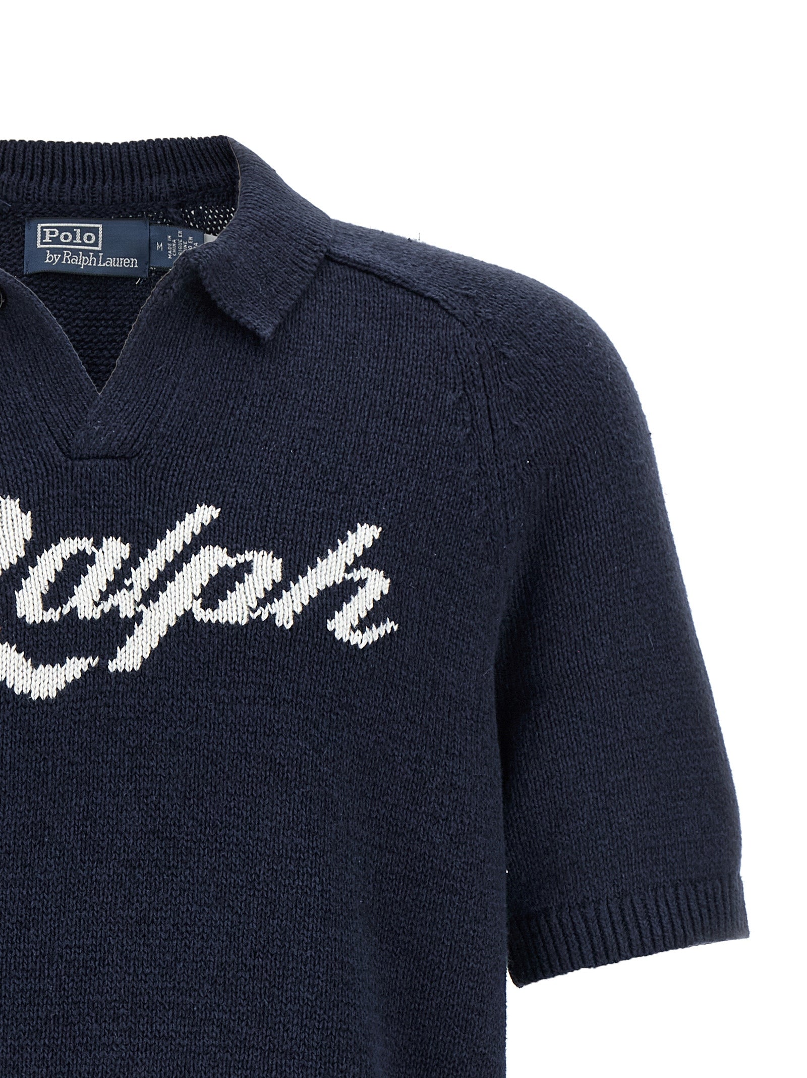 Cardigan en lin bleu Polo Ralph Lauren, léger et élégant, avec boutons et logo brodé sur la poitrine.