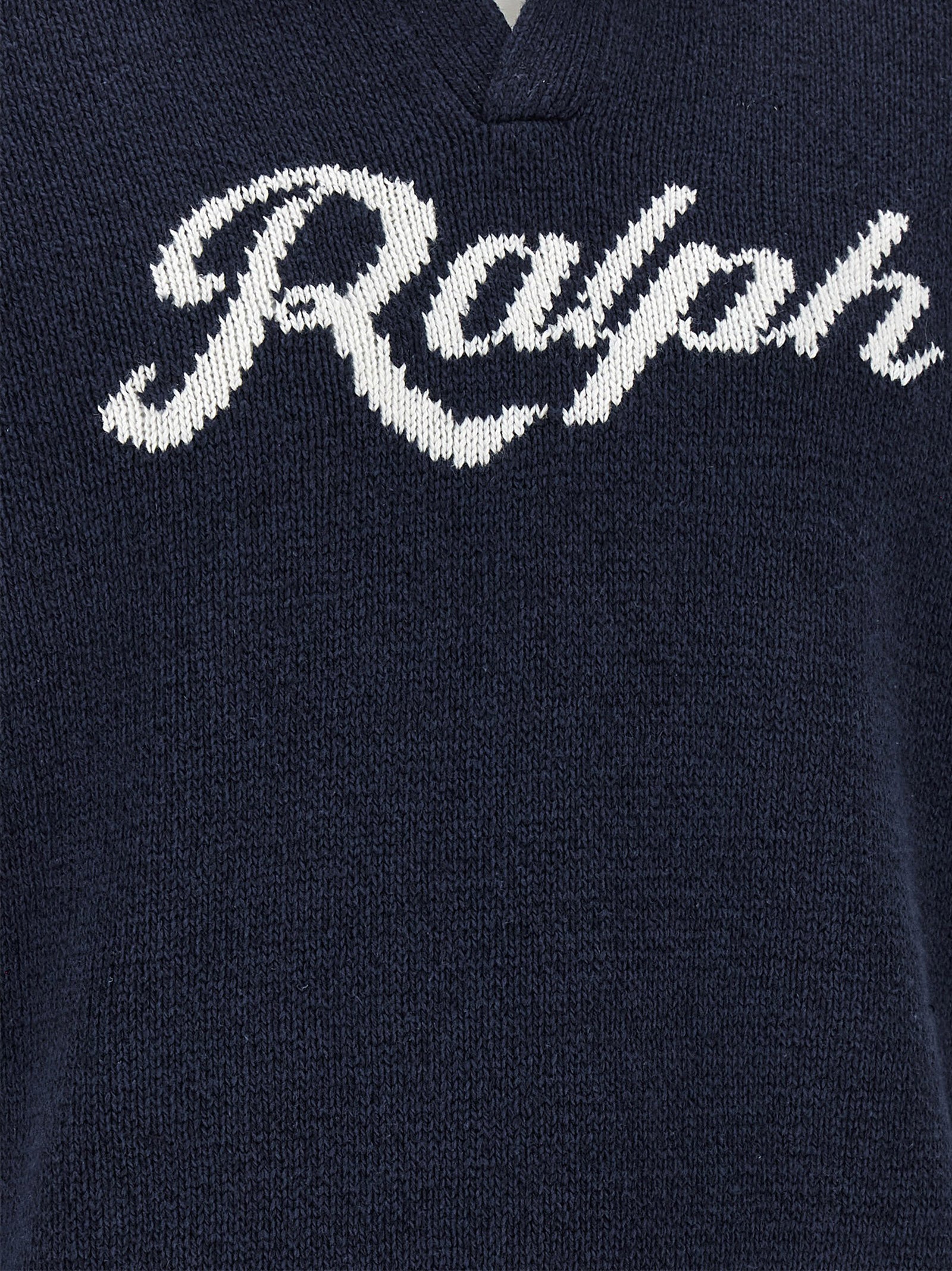 Cardigan en lin bleu Polo Ralph Lauren, veste légère avec col en V et boutons, porté sur un mannequin.