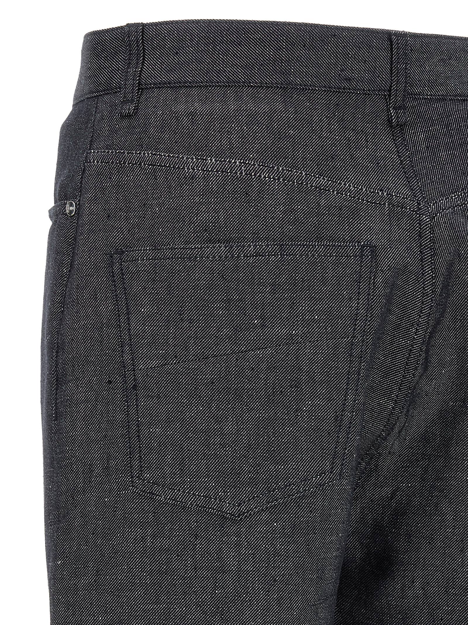 Pantalon en jean gris Fendi en lin à coupe droite, visible avec détails de couture et fermeture éclair.