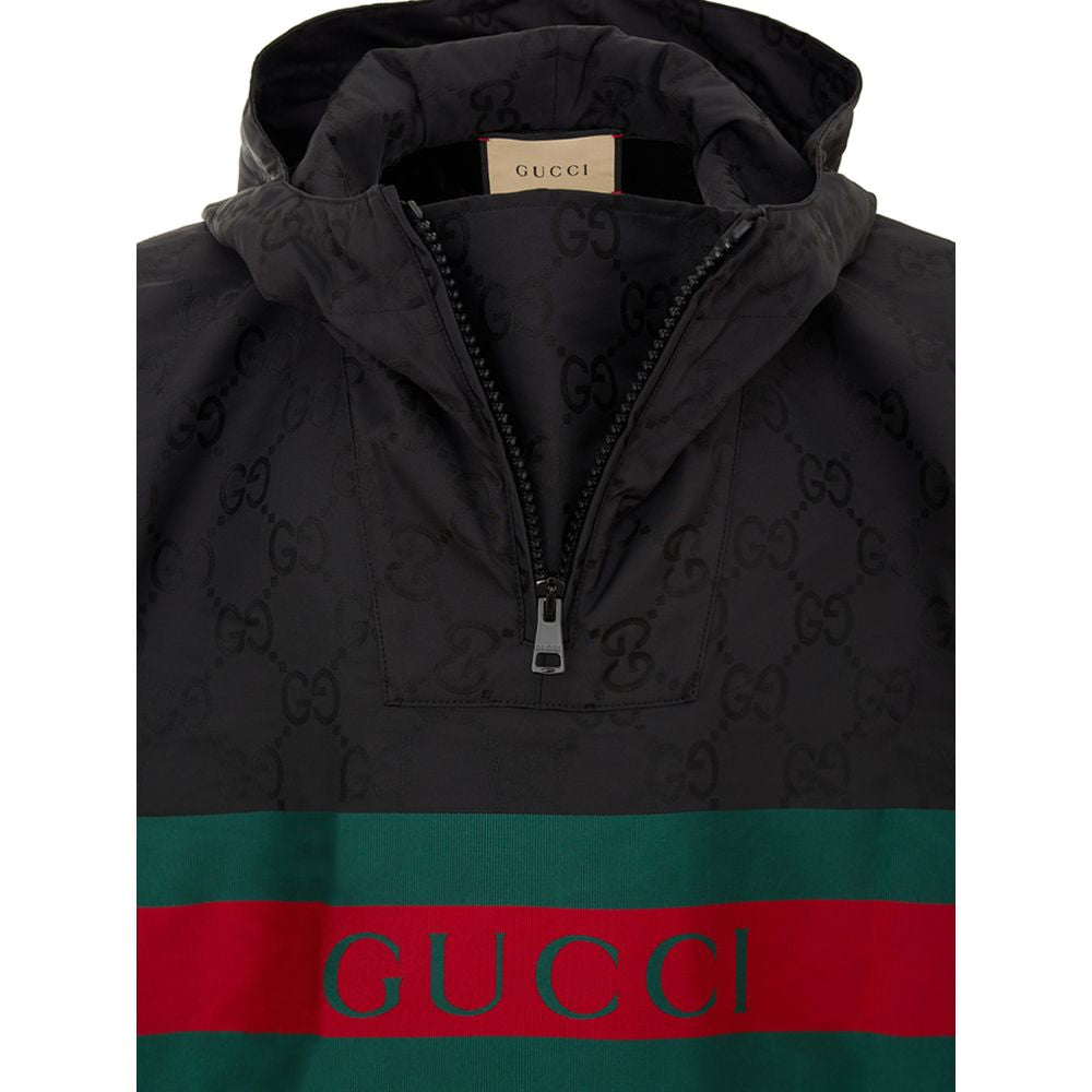 Manteau trench en polyester noir de Gucci, veste élégante avec ceinture et détails sophistiqués, vue de face sur fond neutre.