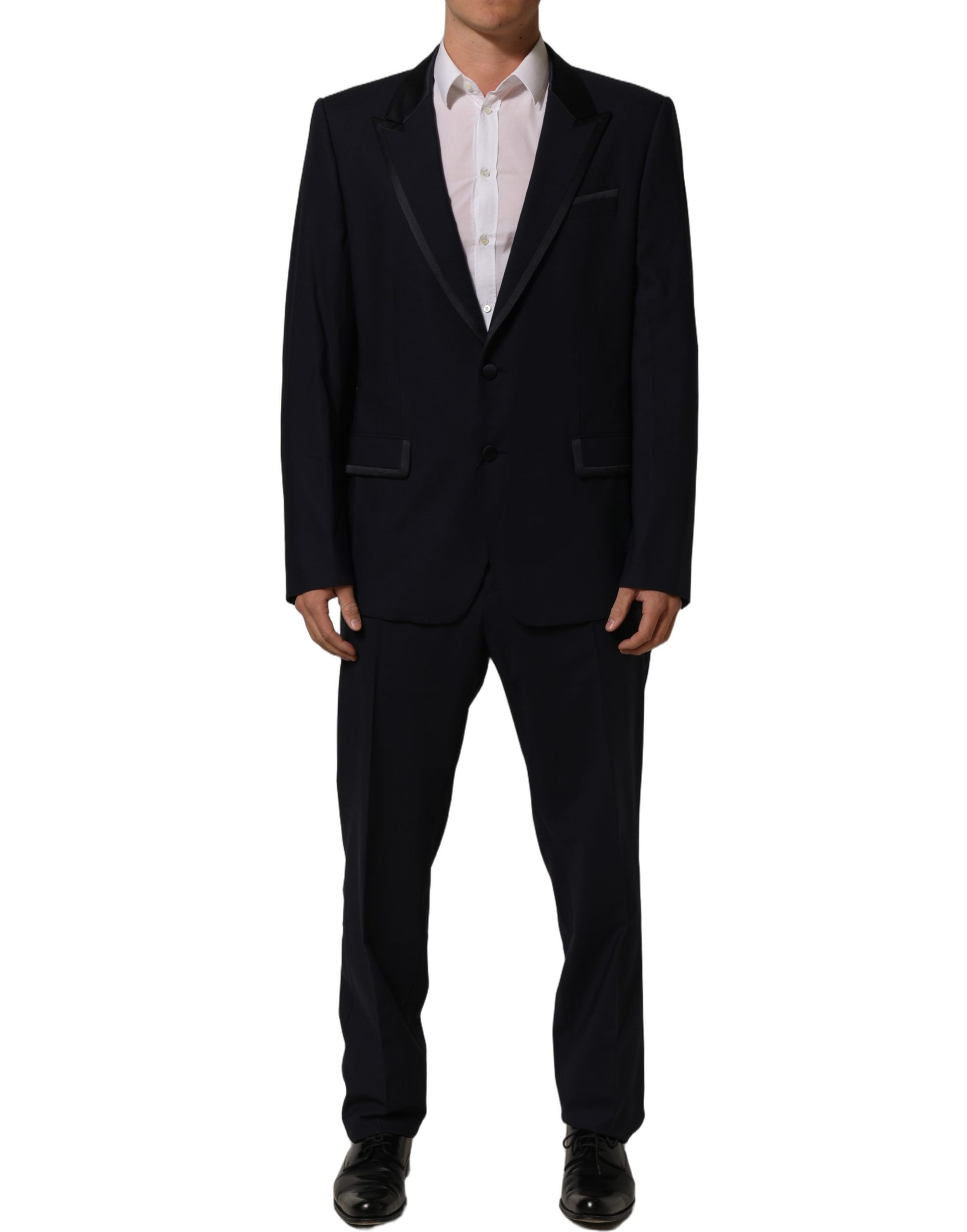Costume homme bleu foncé Dolce & Gabbana, deux pièces, à un ou deux boutons, élégant et sophistiqué, vue de devant.