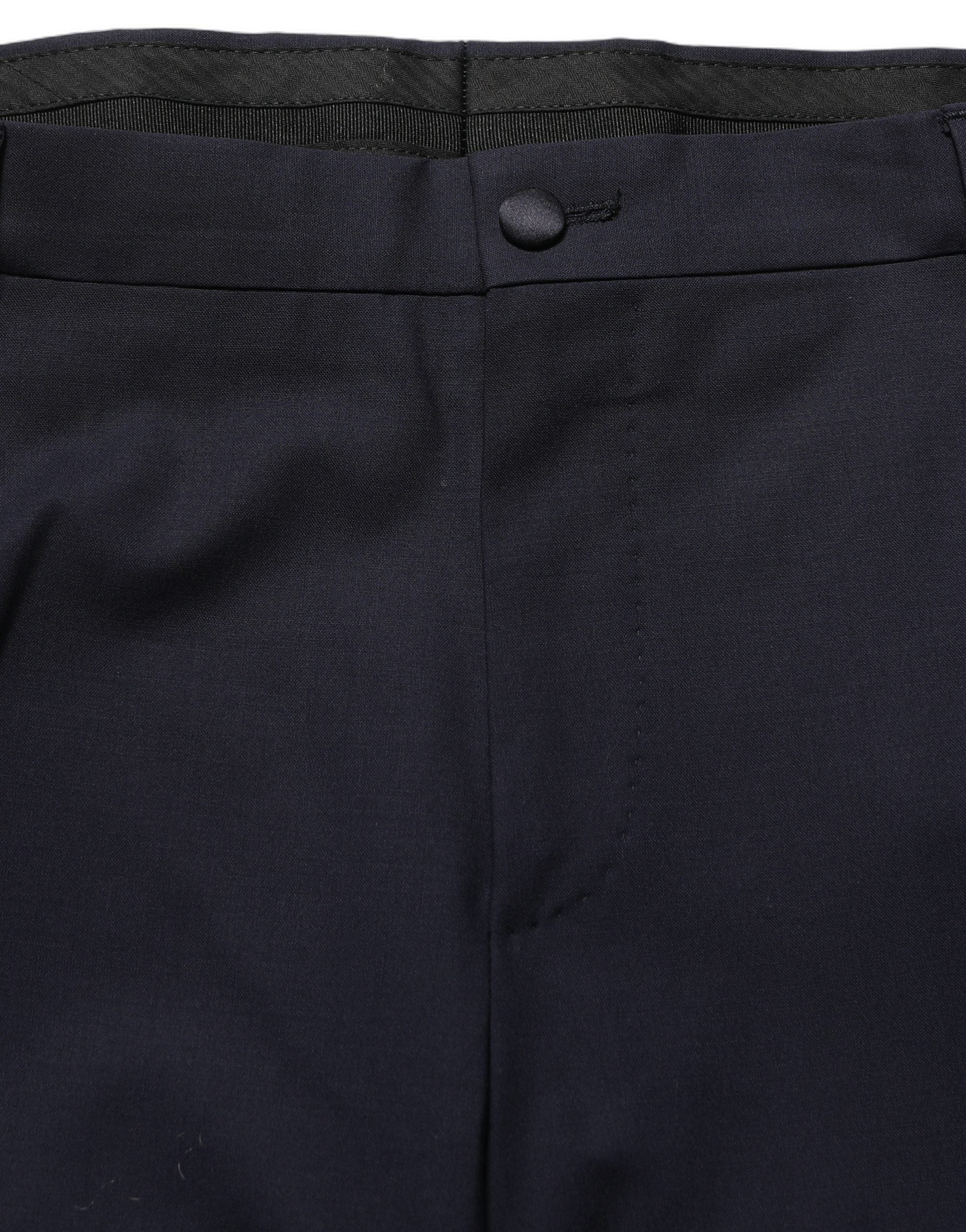 Costume homme deux pièces Dolce & Gabbana bleu foncé à boutons, veste croisée et pantalon assorti, style élégant et classique.