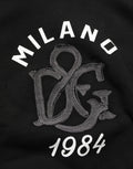 Sweat à capuche noir Dolce & Gabbana en coton avec impression Milano1984, style décontracté et logo visible.