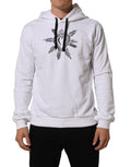 Sweat à capuche blanc Dolce & Gabbana Sacred Heart avec motif du cœur sacré, en coton doux, porté sur un modèle.
