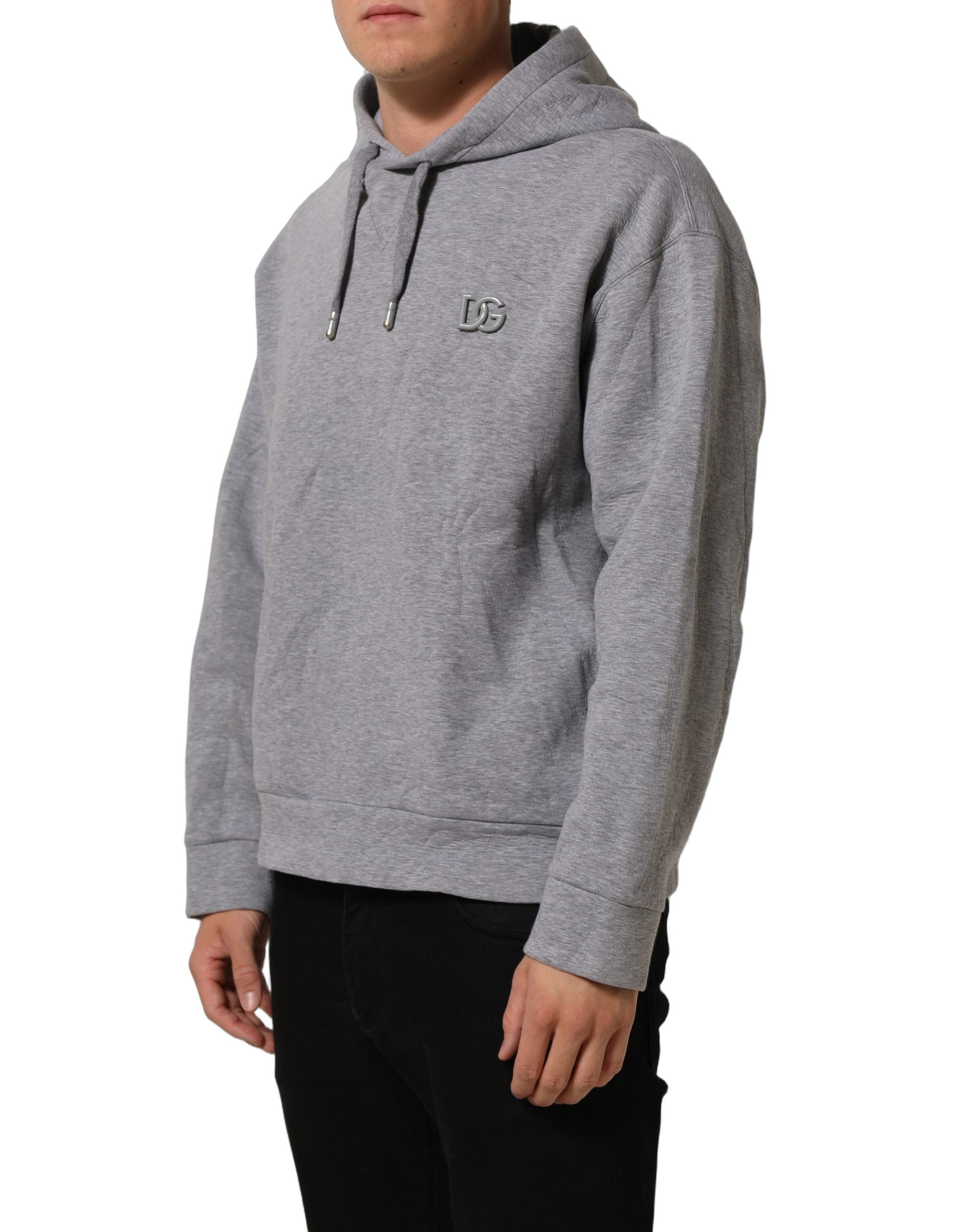 Sweat à capuche en coton gris Dolce & Gabbana avec logo, style décontracté et moderne, porté ou posé sur un fond neutre.