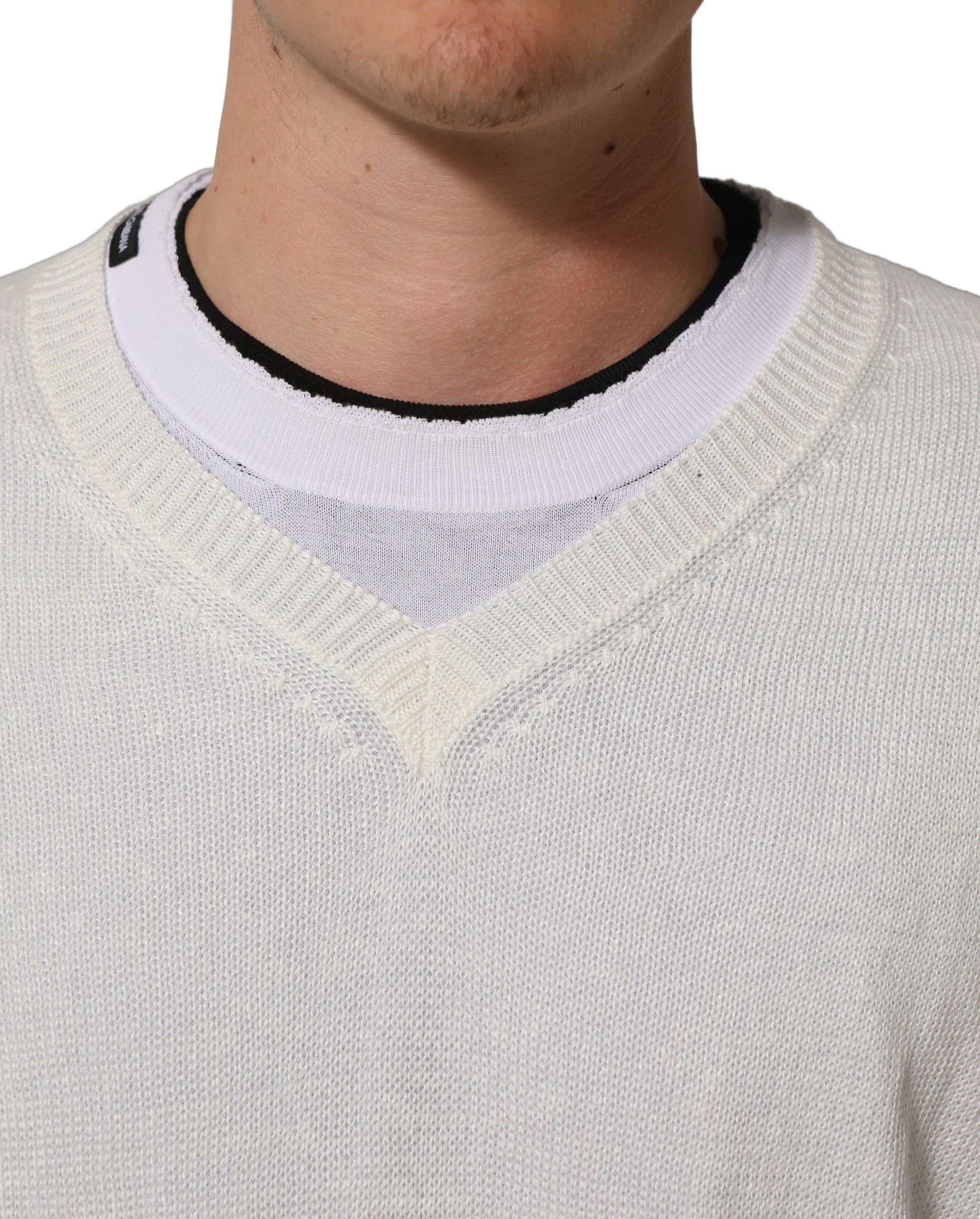Pull-over blanc en lin Dolce & Gabbana à col rond et design en couches, style décontracté et élégant.