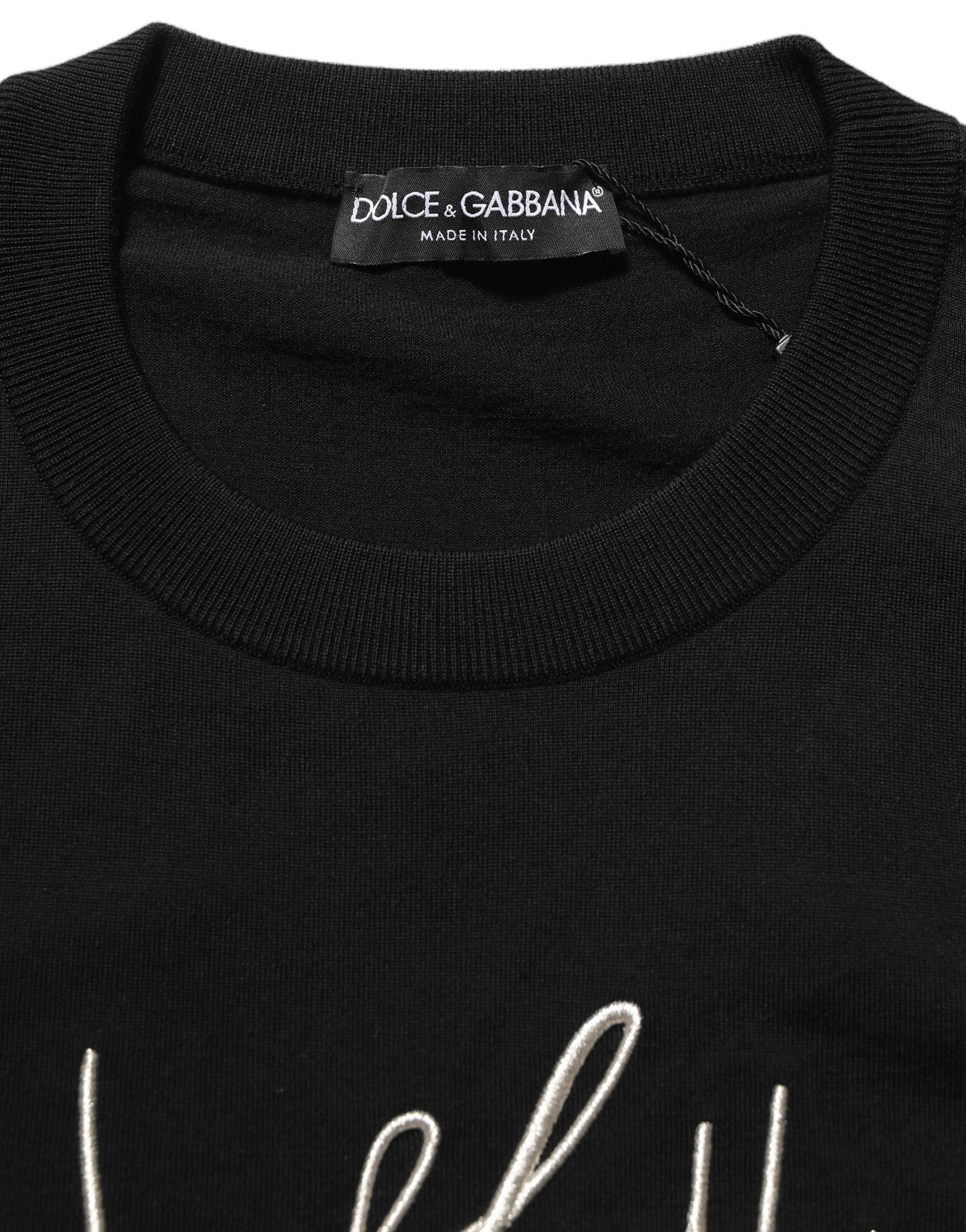 Pull à col rond noir Dolce & Gabbana homme avec broderies DG visible sur le devant.