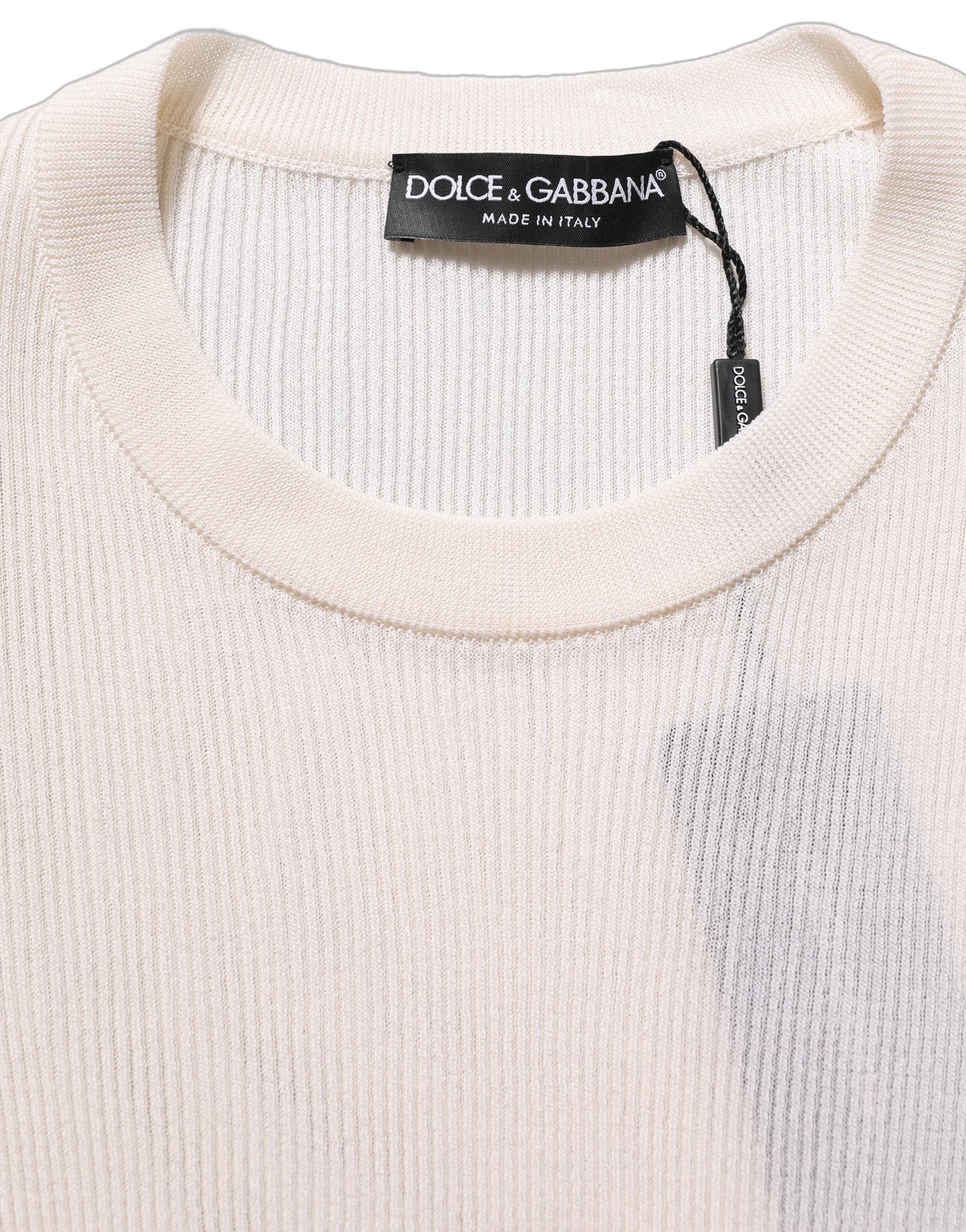 Pull en soie blanc pour homme Dolce & Gabbana avec col rond, tissu élégant et confortable visible sur l'image.