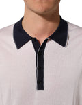 Pull en soie blanc Dolce & Gabbana avec col montant et manches longues, élégant et confortable pour un look sophistiqué.