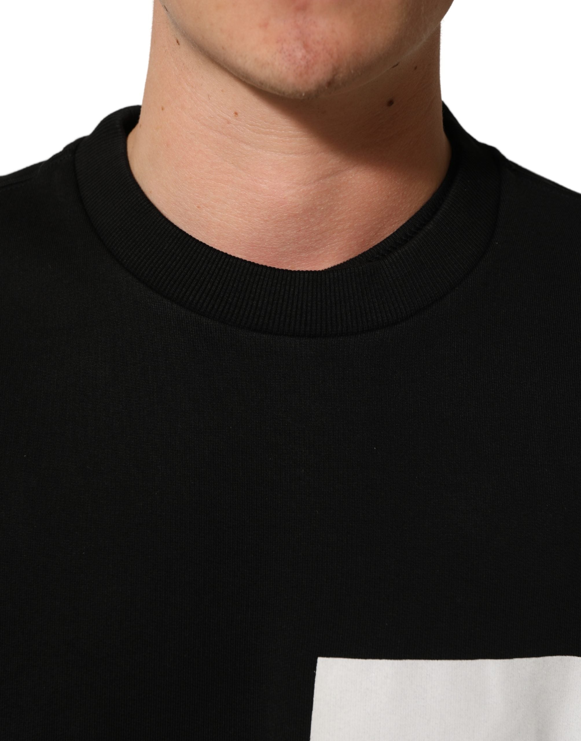 Sweatshirt Dolce & Gabbana en coton noir avec logo imprimé, pull décontracté et stylé.