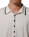 T-shirt homme en soie noir avec imprimé feuillage Dolce & Gabbana, col rond, style élégant et moderne.