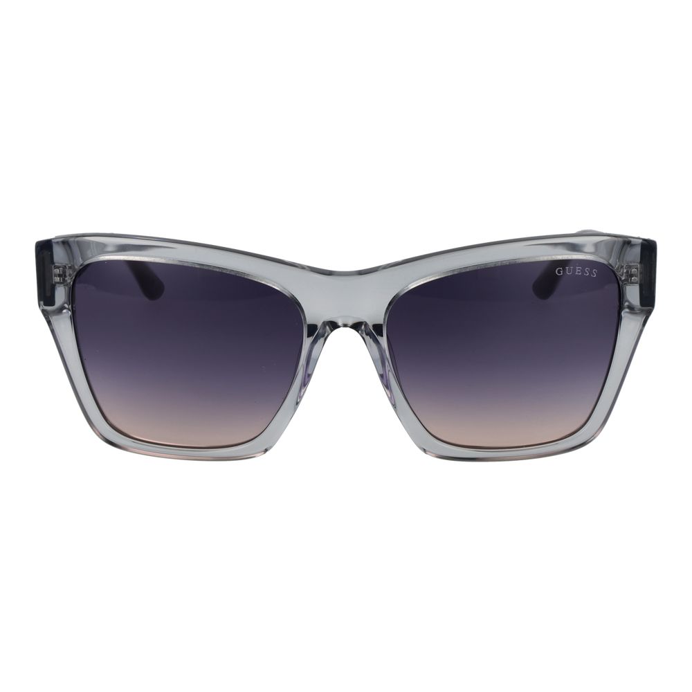 Lunettes de soleil Guess en acétate gris, avec monture élégante et design moderne, visibles sur la photo.
